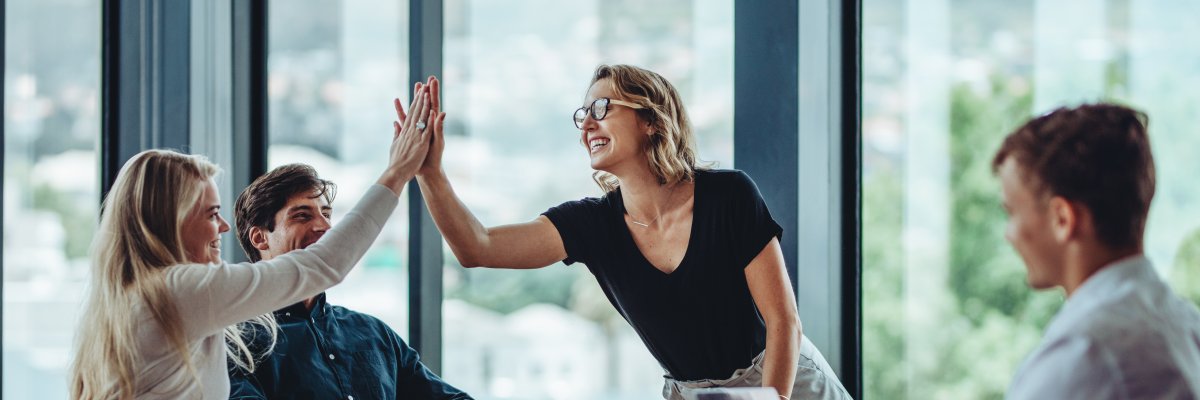 Group of colleagues celebrating success
